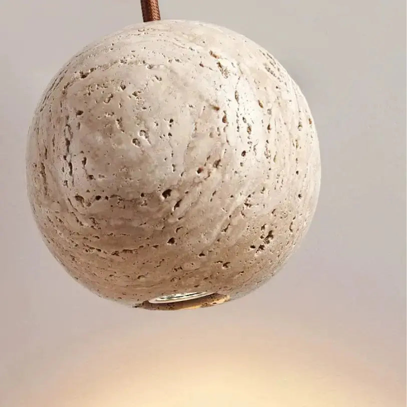 Suspension design sphérique nordique en travertin | Sten NORDSIA